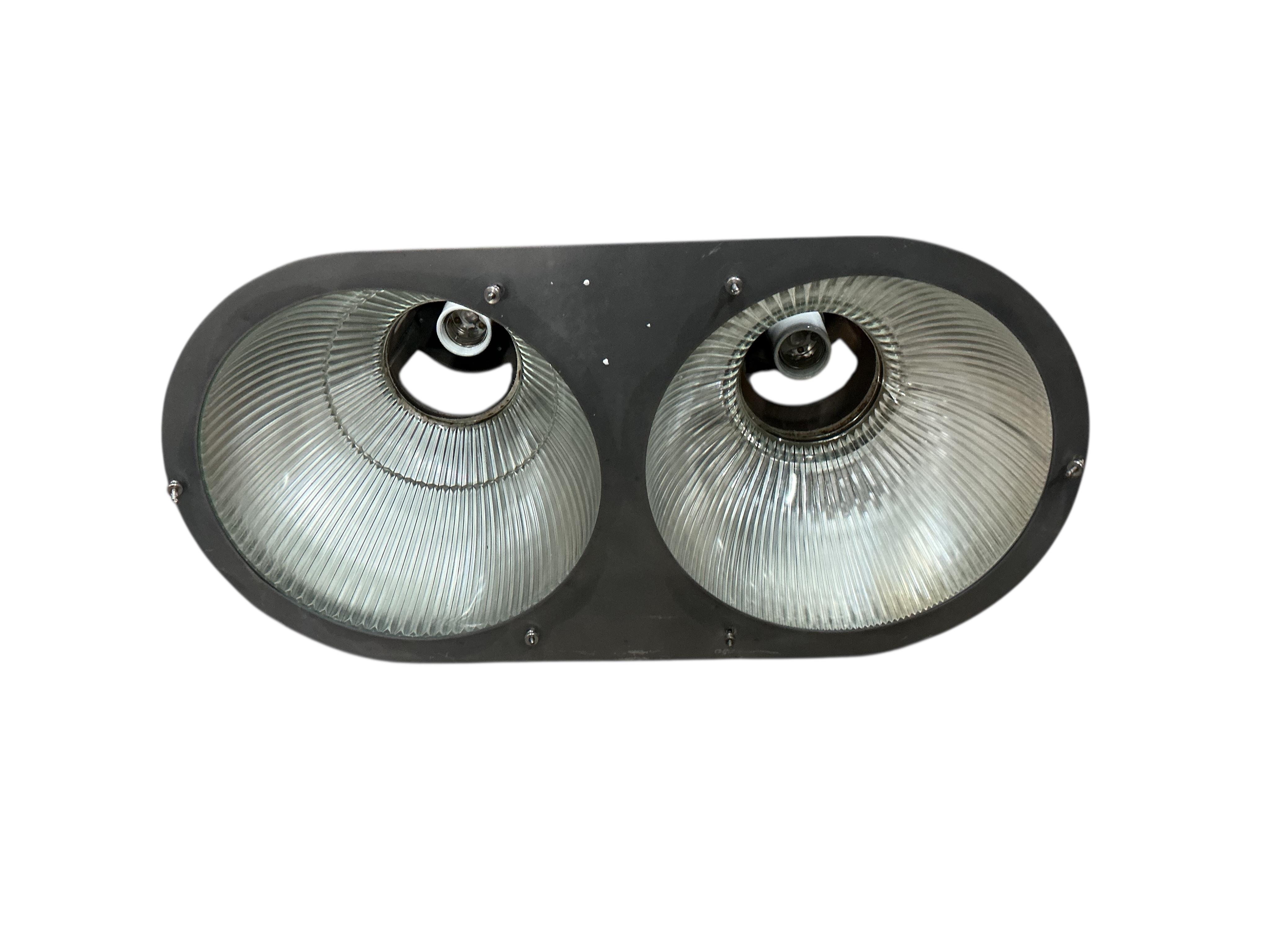 A pair of Holophane double industrial factory lights, width 64cm, height 42cm